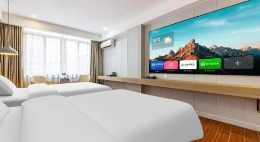 Bed in Borrman Hotel Shaoguan Century East Street Fengcai Building