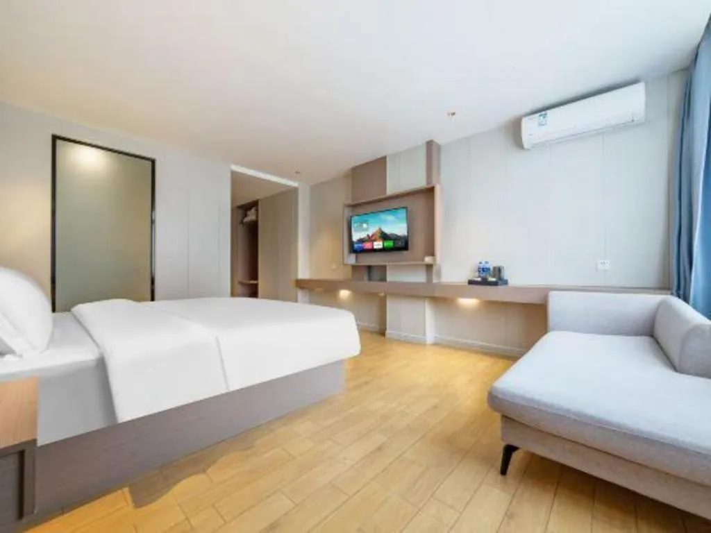 Bed in Borrman Hotel Shaoguan Century East Street Fengcai Building