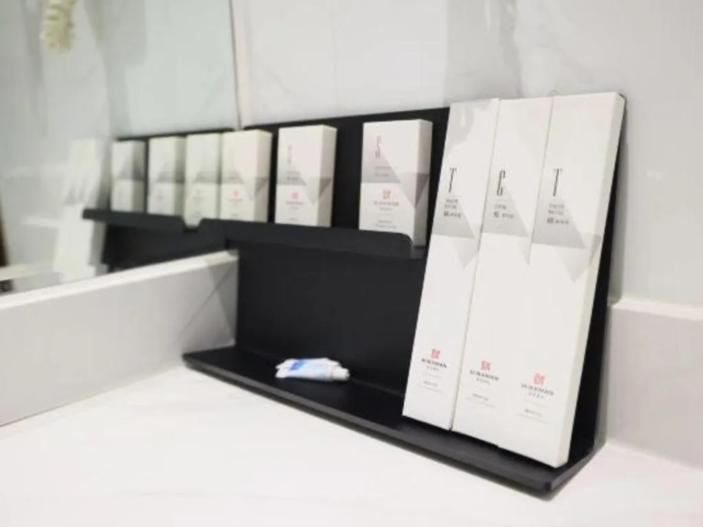 Bed in Borrman Hotel Shaoguan Century East Street Fengcai Building