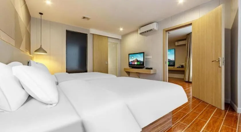 Bed in Borrman Hotel Shaoguan Century East Street Fengcai Building