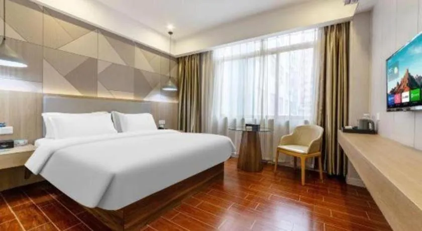 Bed in Borrman Hotel Shaoguan Century East Street Fengcai Building