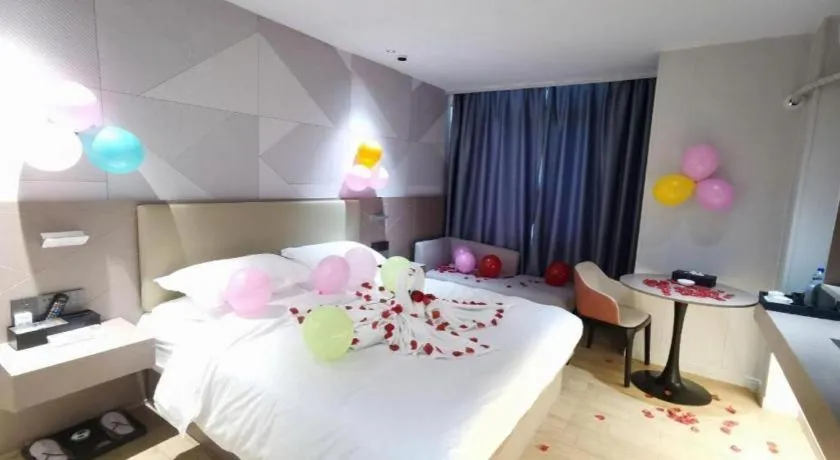 Bed in Borrman Hotel Shaoguan Century East Street Fengcai Building