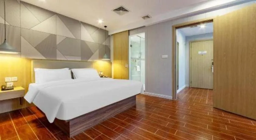 Bed in Borrman Hotel Shaoguan Century East Street Fengcai Building