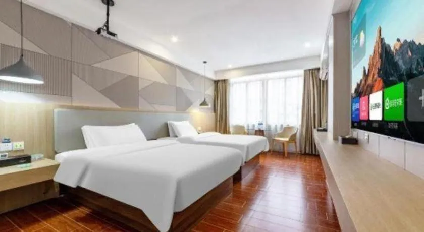 Bed in Borrman Hotel Shaoguan Century East Street Fengcai Building