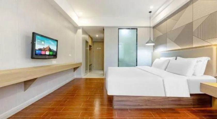 Bed in Borrman Hotel Shaoguan Century East Street Fengcai Building