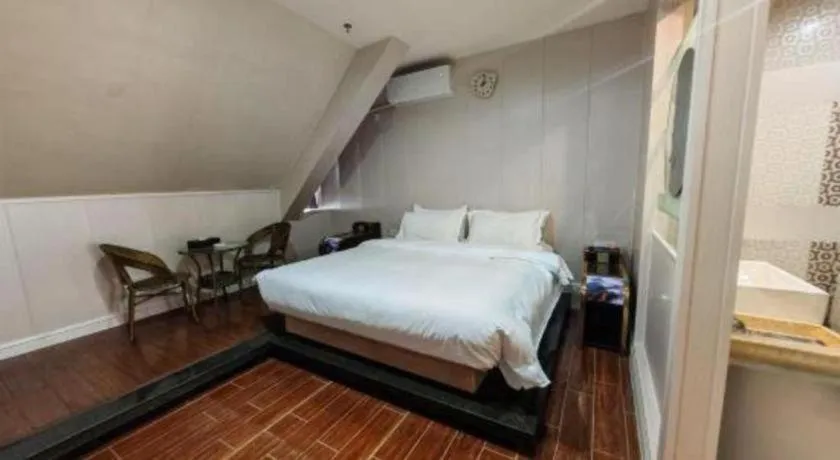 Bed in Borrman Hotel Shaoguan Century East Street Fengcai Building