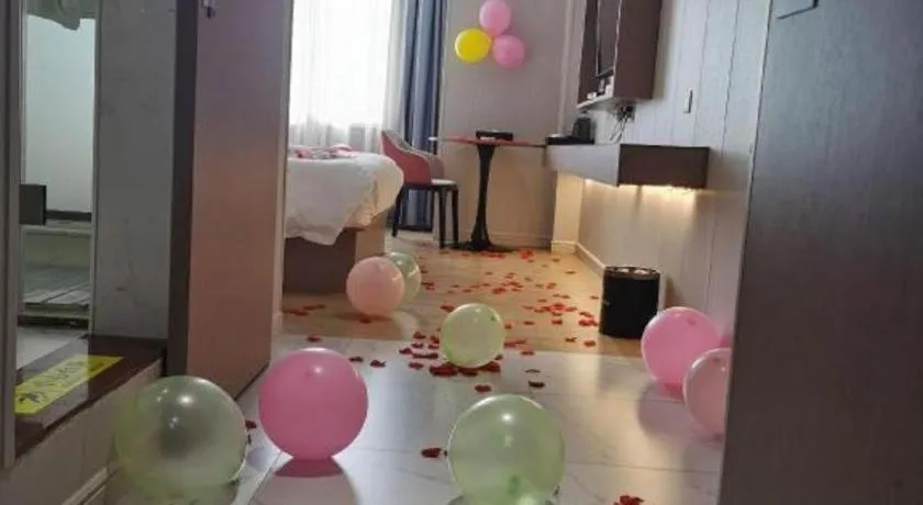 Bed in Borrman Hotel Shaoguan Century East Street Fengcai Building