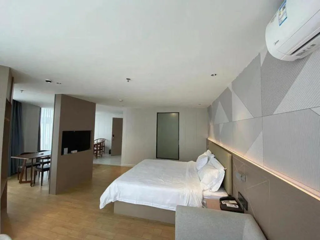 Bed in Borrman Hotel Shaoguan Century East Street Fengcai Building