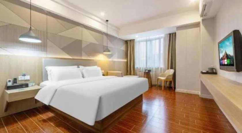 Bed in Borrman Hotel Shaoguan Century East Street Fengcai Building