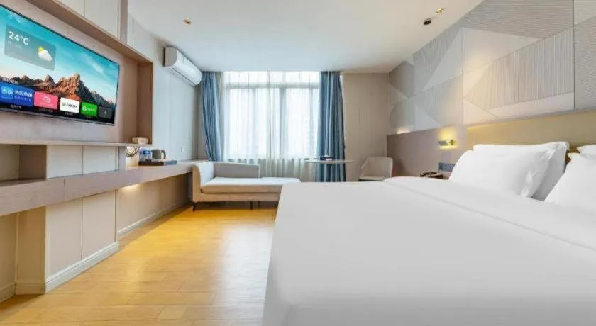 Bed in Borrman Hotel Shaoguan Century East Street Fengcai Building