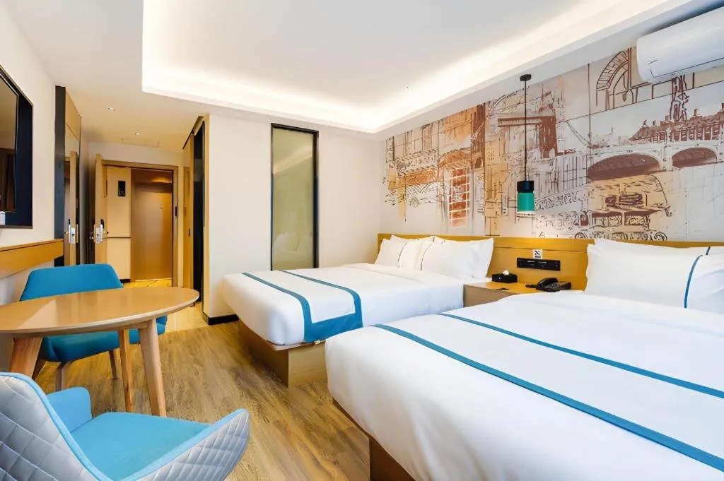 Bed in City Comfort Inn Zhuhai Doumen Daxin Xinduhui Pedestrian Street