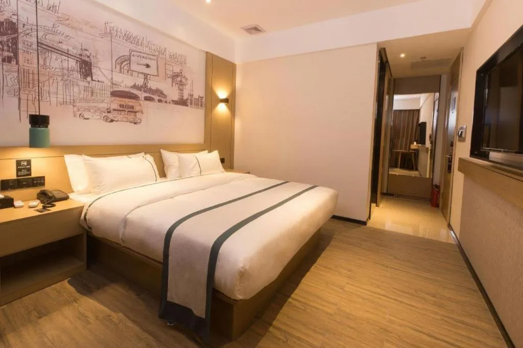 Bed in City Comfort Inn Zhuhai Doumen Daxin Xinduhui Pedestrian Street