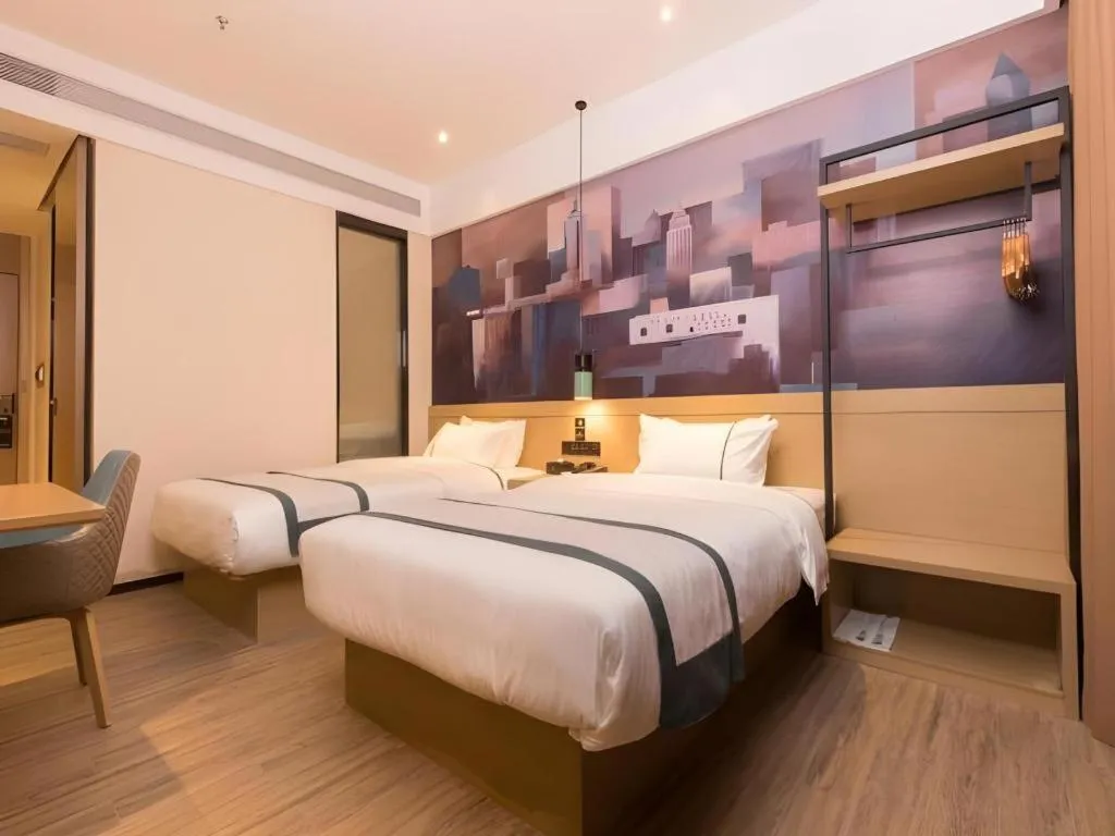Bed in City Comfort Inn Zhuhai Doumen Daxin Xinduhui Pedestrian Street