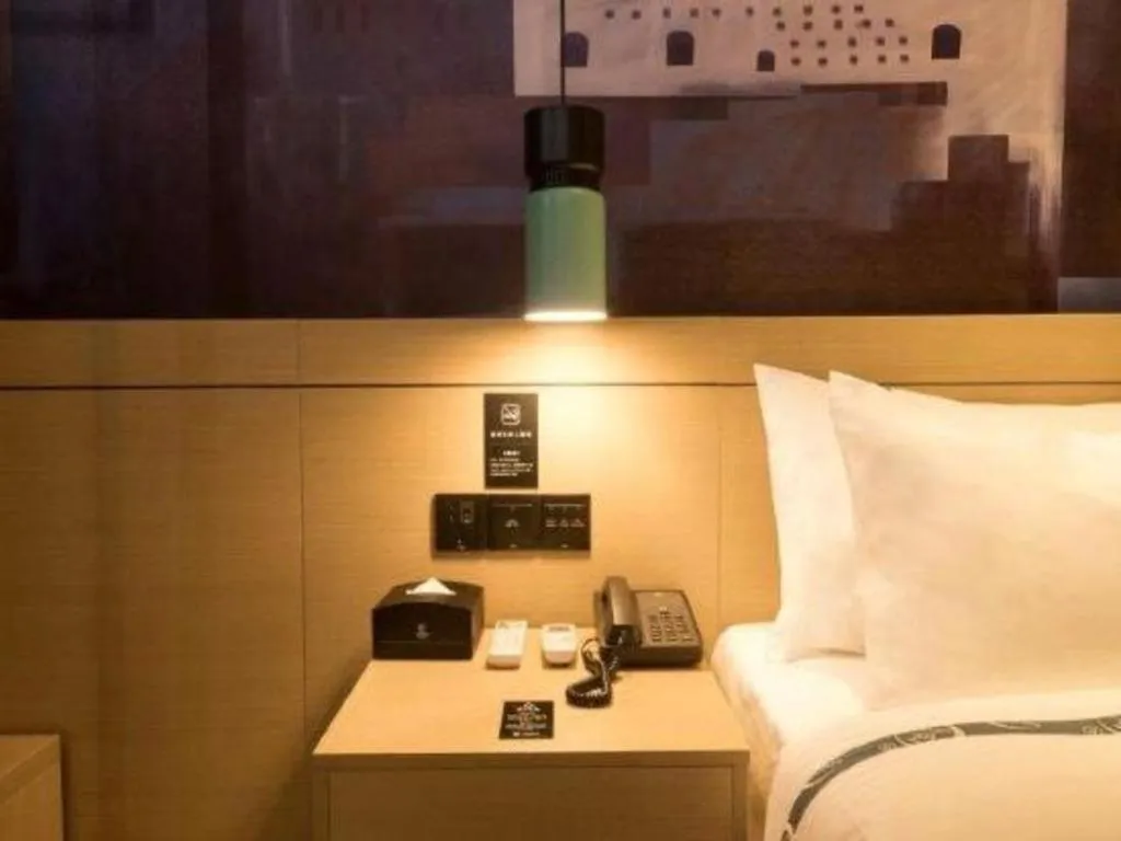 Bed in City Comfort Inn Zhuhai Doumen Daxin Xinduhui Pedestrian Street