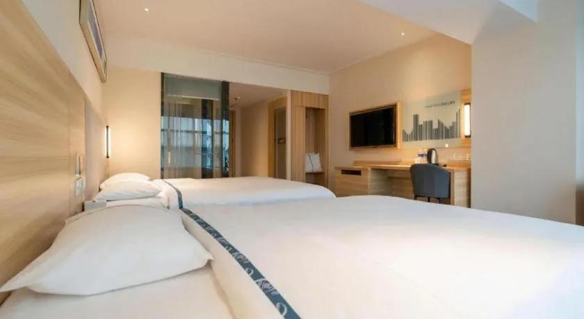 Bed in City Comfort Inn Chengdu Giant Panda Base