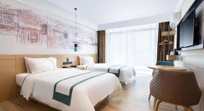 Bed in City Comfort Inn Haikou Xiuying District Wanda Plaza