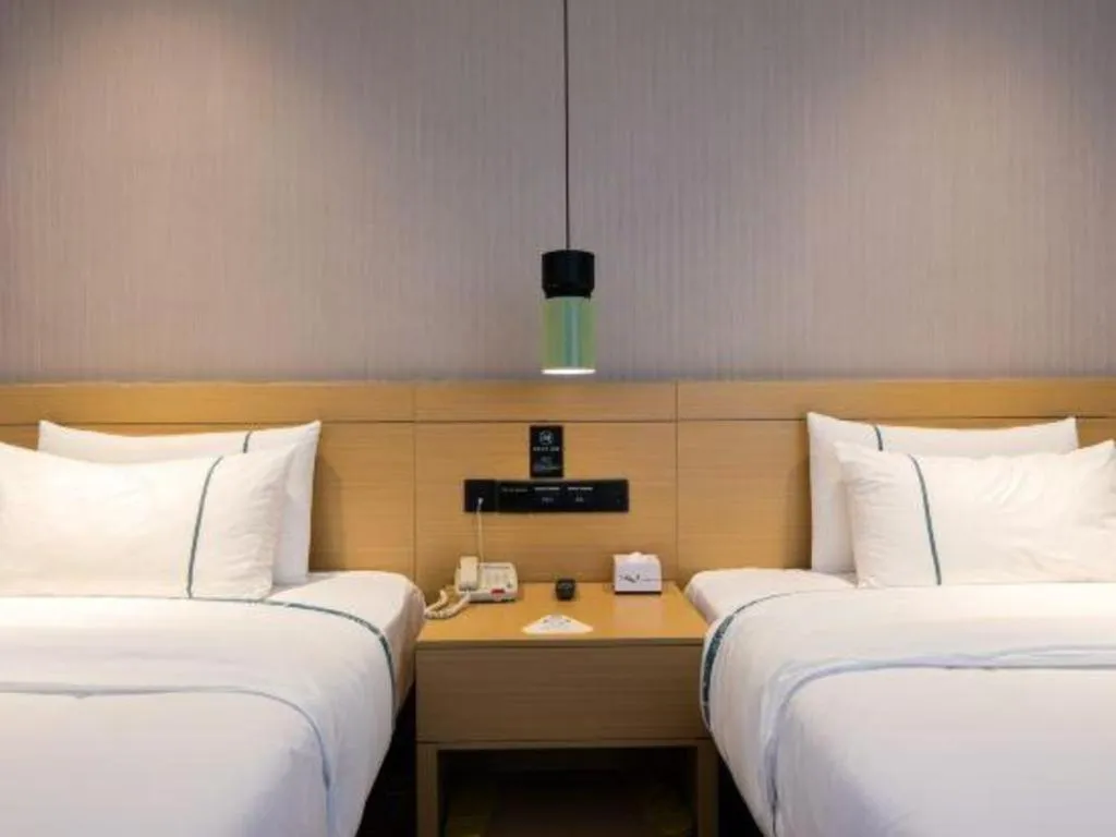 Bed in City Comfort Inn Kunming Xinluojiu Bay Guangju Road