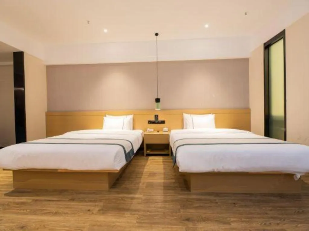 Bed in City Comfort Inn Kunming Xinluojiu Bay Guangju Road