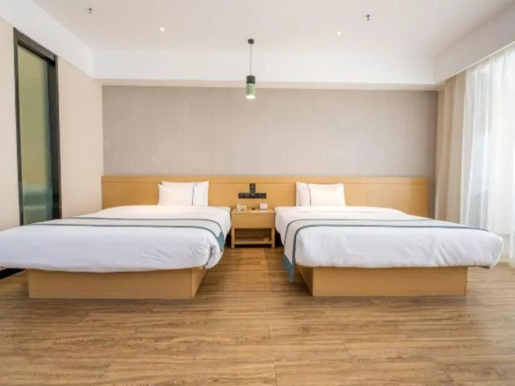 Bed in City Comfort Inn Kunming Xinluojiu Bay Guangju Road