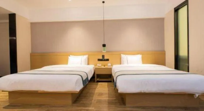 Bed in City Comfort Inn Kunming Xinluojiu Bay Guangju Road