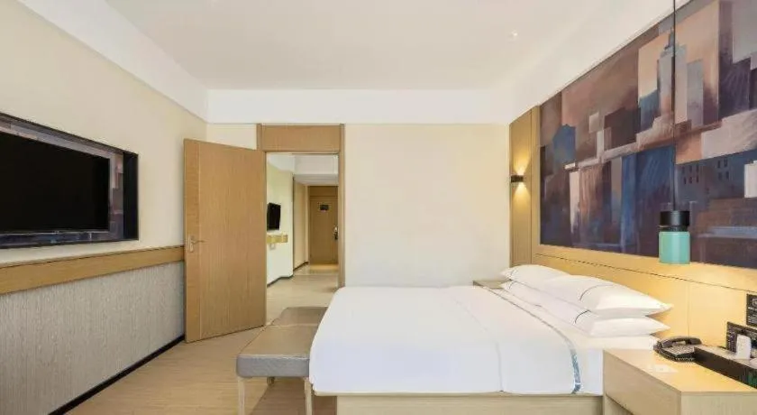 Bed in City Comfort Inn Shaoguan High-speed Railway Station Guanshaoyuan