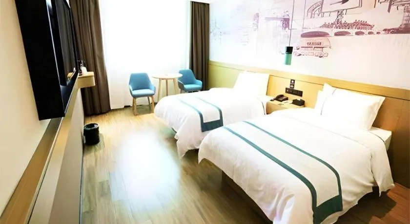 Bed in City Comfort Inn Shaoguan High-speed Railway Station Guanshaoyuan