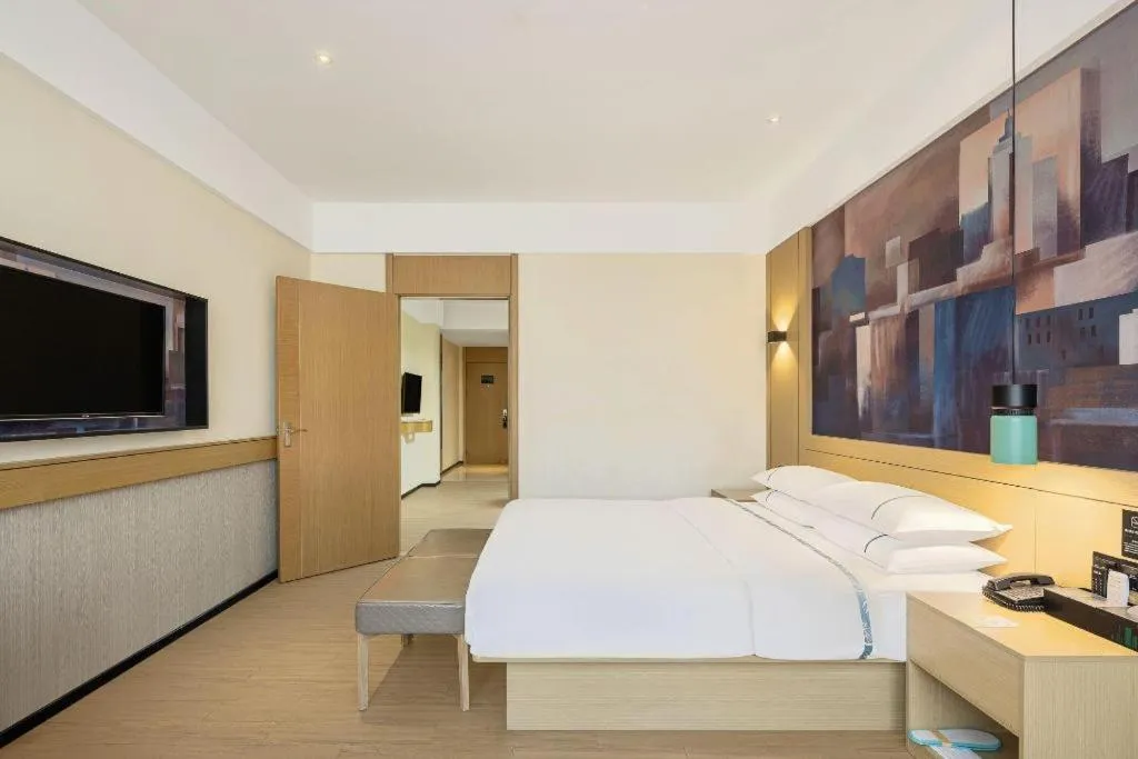 Bed in City Comfort Inn Shaoguan High-speed Railway Station Guanshaoyuan