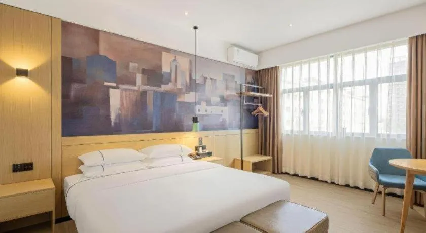 Bed in City Comfort Inn Shaoguan High-speed Railway Station Guanshaoyuan