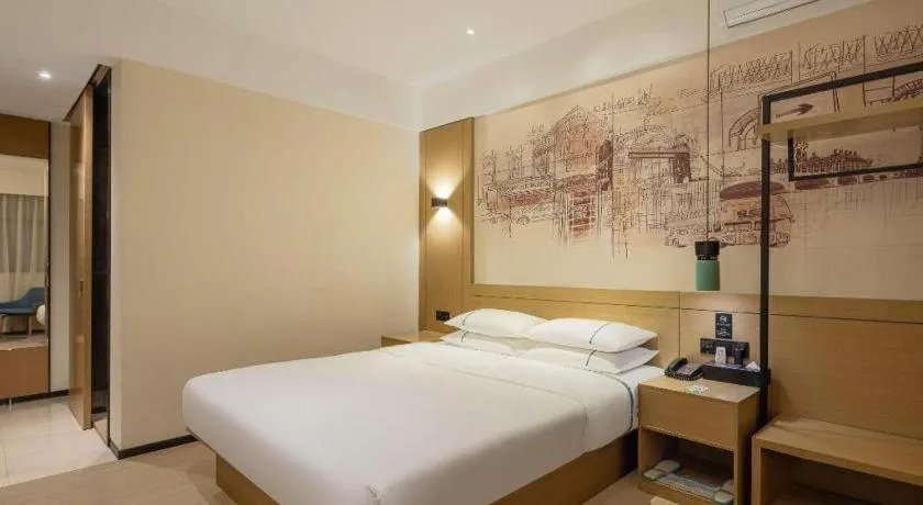 Bed in City Comfort Inn Shaoguan High-speed Railway Station Guanshaoyuan