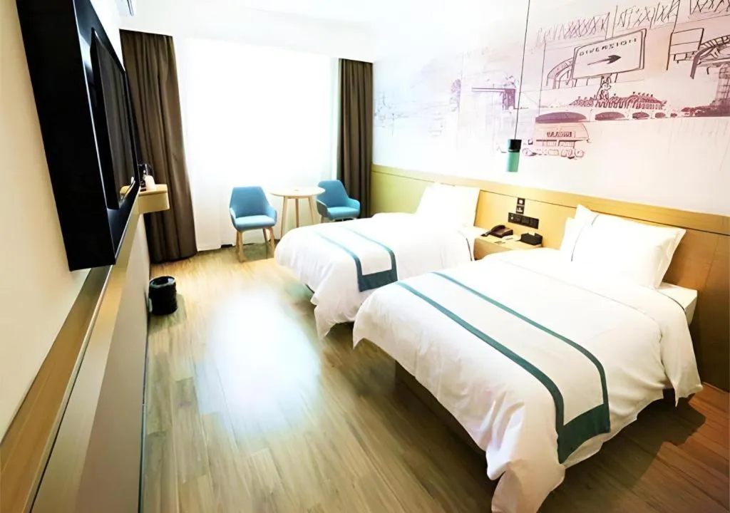 Bed in City Comfort Inn Shaoguan High-speed Railway Station Guanshaoyuan