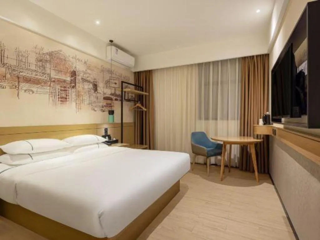 Bed in City Comfort Inn Shaoguan High-speed Railway Station Guanshaoyuan