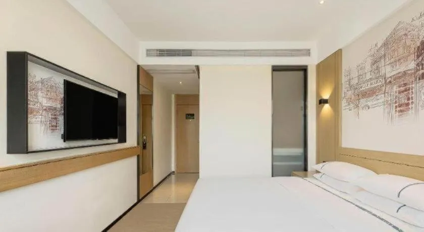 Bed in City Comfort Inn Shaoguan High-speed Railway Station Guanshaoyuan