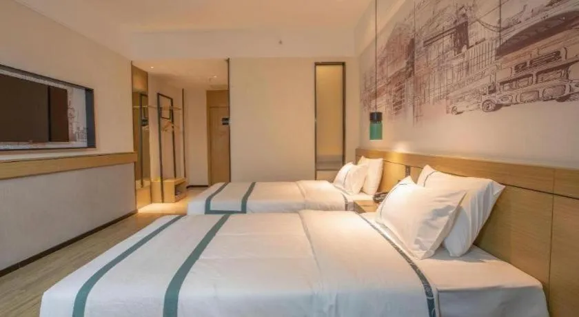 Bed in City Comfort Inn Shaoguan High-speed Railway Station Guanshaoyuan