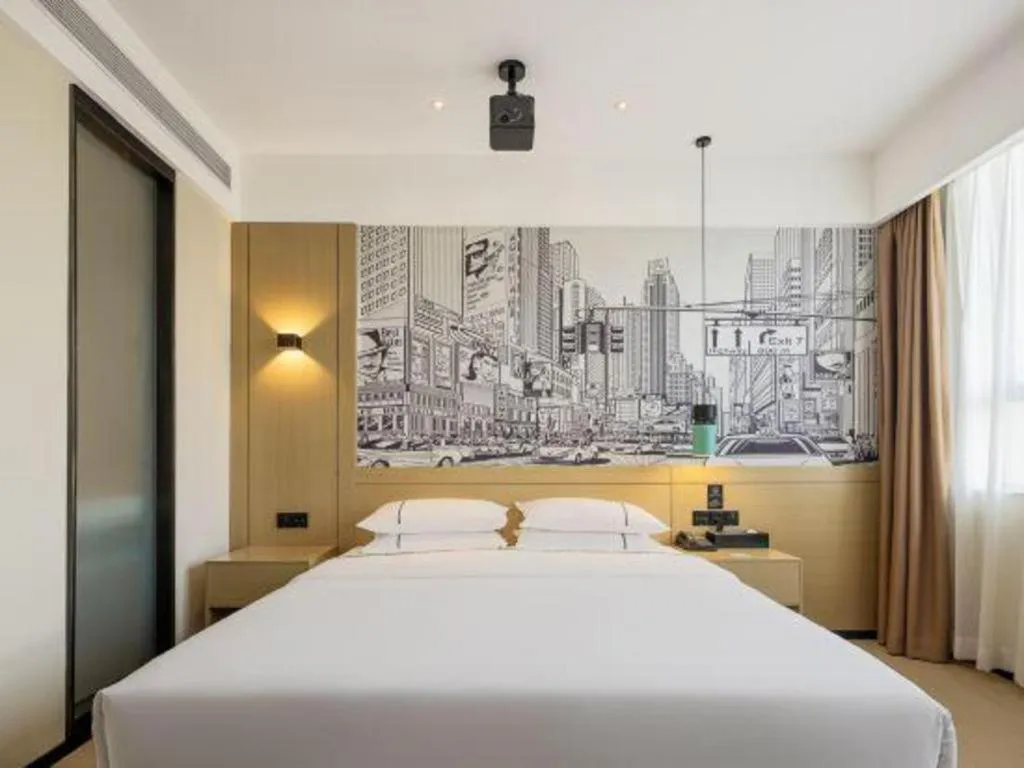 Bed in City Comfort Inn Shaoguan High-speed Railway Station Guanshaoyuan