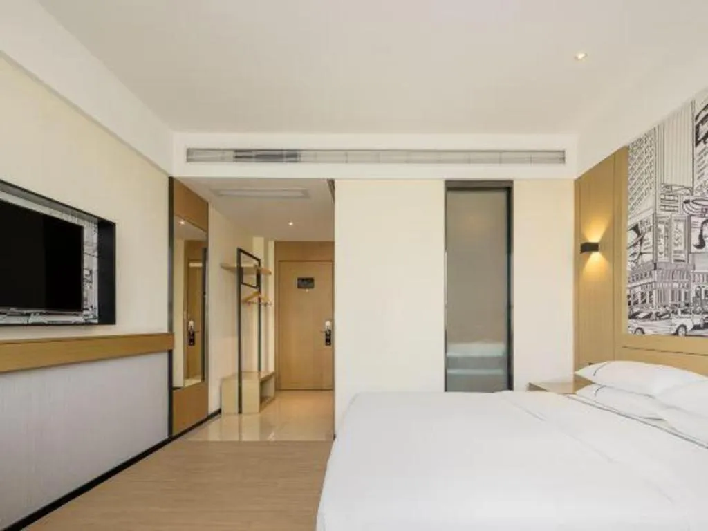 Bed in City Comfort Inn Shaoguan High-speed Railway Station Guanshaoyuan