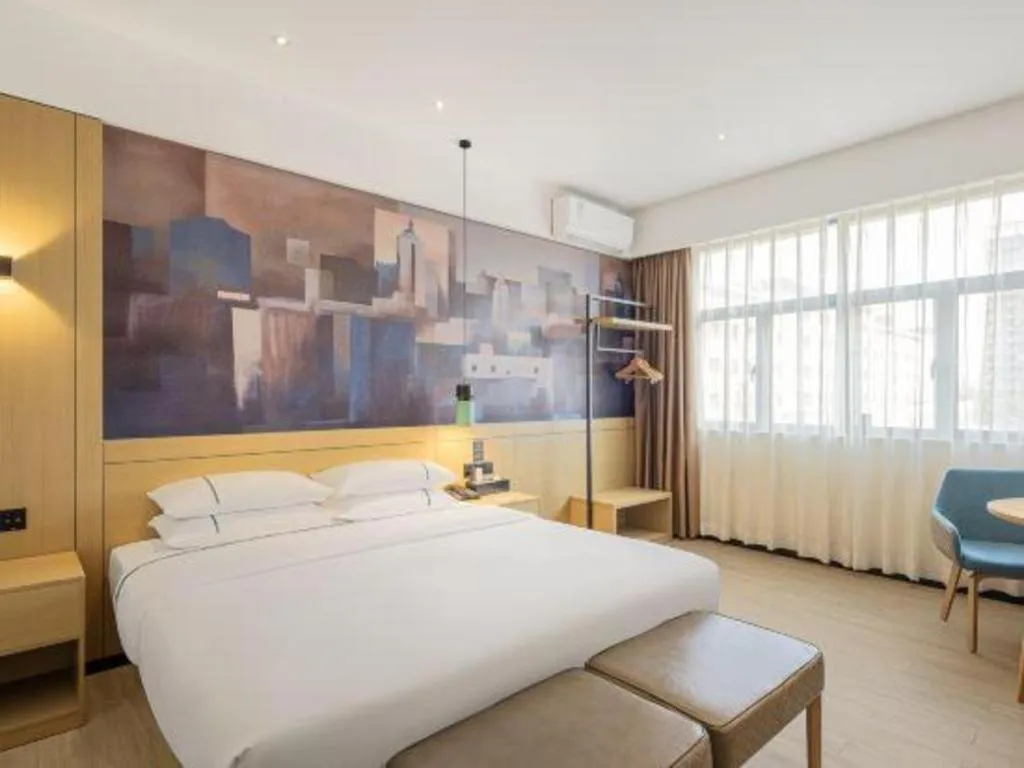 Bed in City Comfort Inn Shaoguan High-speed Railway Station Guanshaoyuan