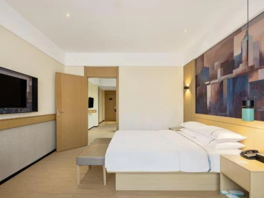 Bed in City Comfort Inn Shaoguan High-speed Railway Station Guanshaoyuan