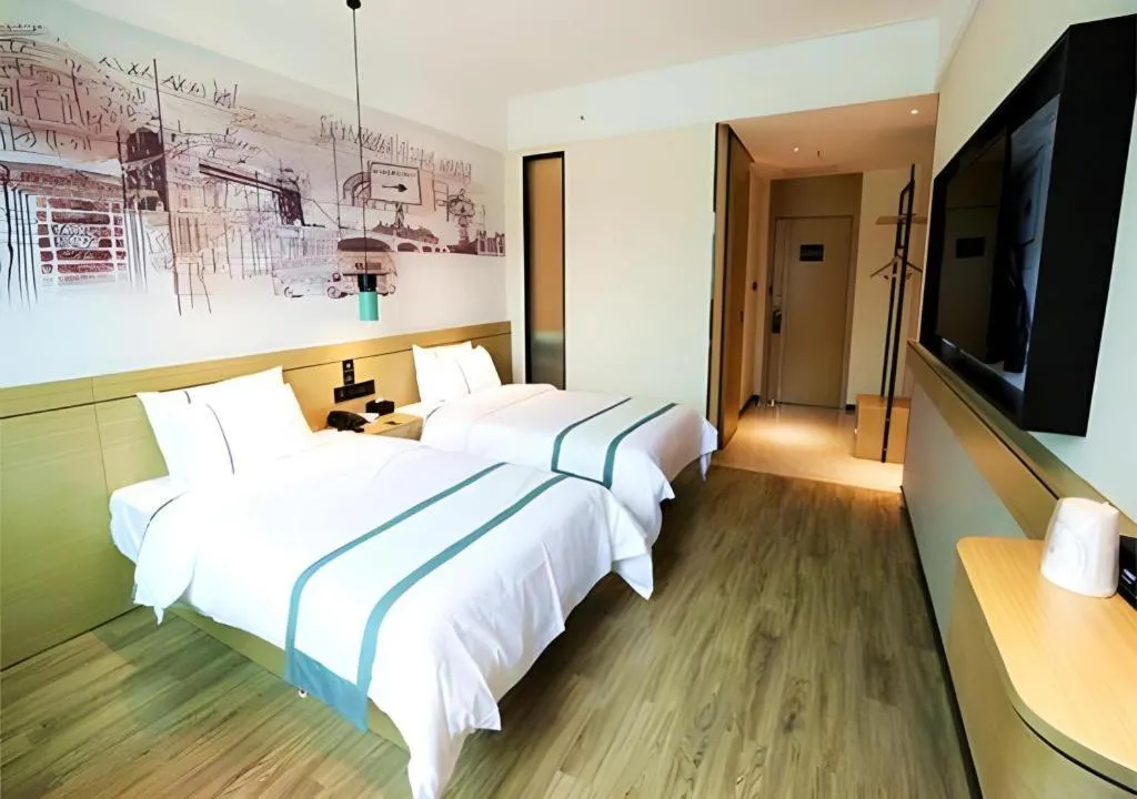 Bed in City Comfort Inn Shaoguan High-speed Railway Station Guanshaoyuan