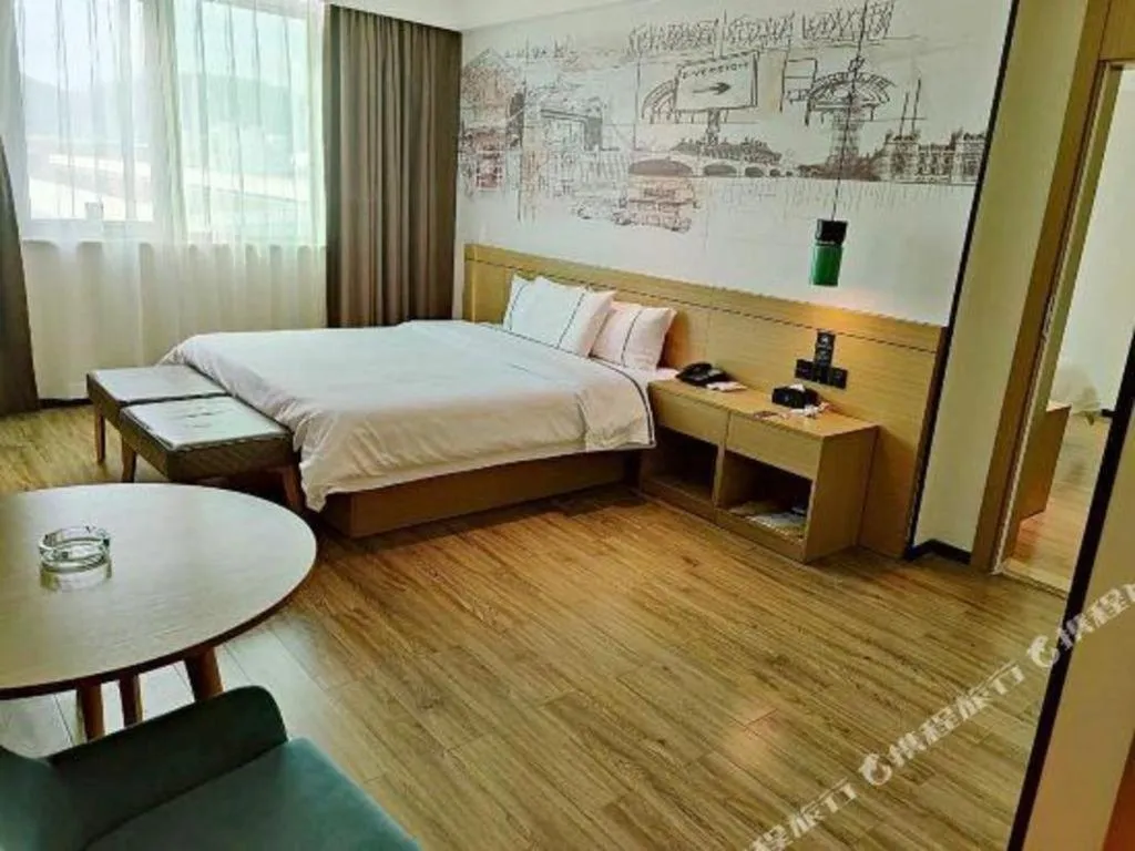 Bed in City Comfort Inn Shaoguan High-speed Railway Station Guanshaoyuan