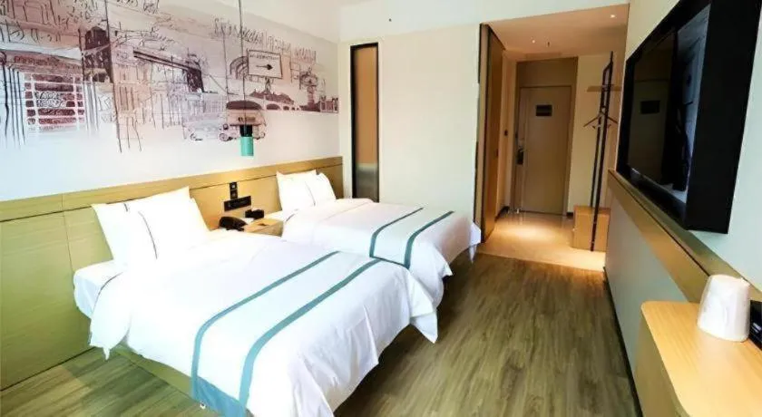 Bed in City Comfort Inn Shaoguan High-speed Railway Station Guanshaoyuan