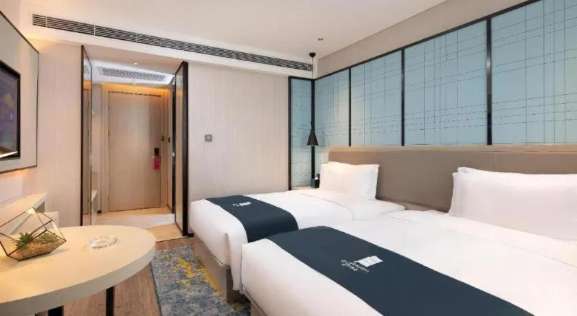 Bed in Echarm Hotel Shenyang Zhongjie North Station Metro Station