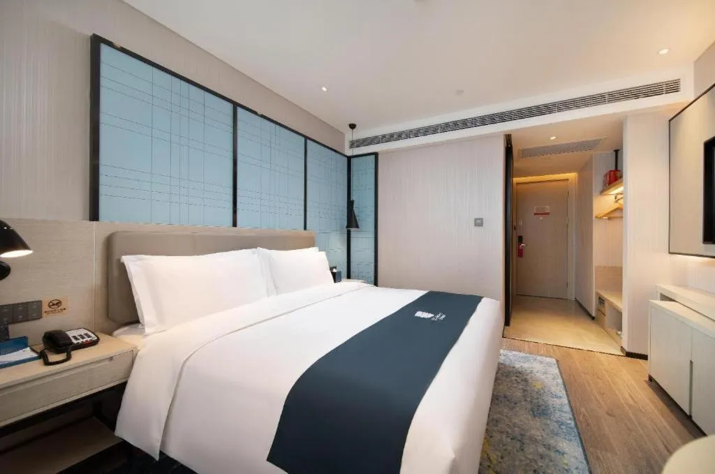 Bed in Echarm Hotel Shenyang Zhongjie North Station Metro Station