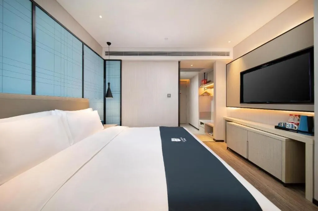 Bed in Echarm Hotel Shenyang Zhongjie North Station Metro Station