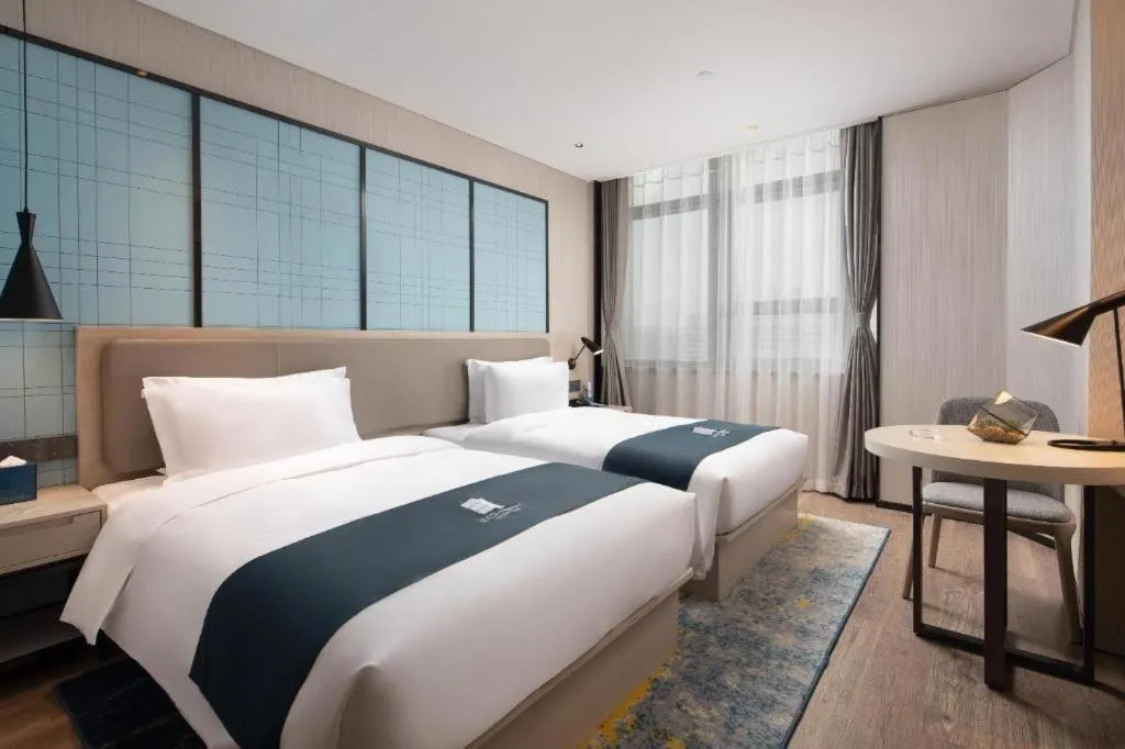 Bed in Echarm Hotel Shenyang Zhongjie North Station Metro Station