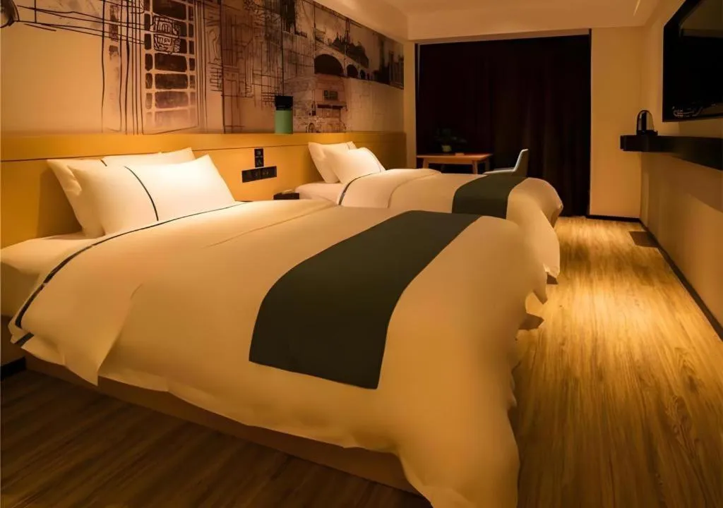 Bed in City Comfort Inn Changsha Outlets Datuo Metro Station