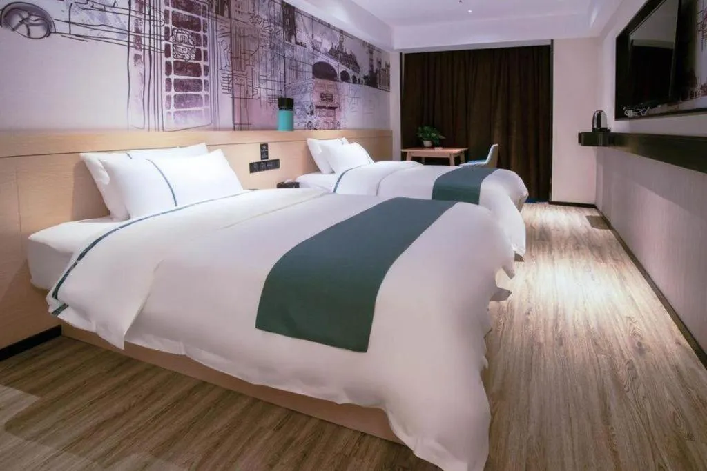 Bed in City Comfort Inn Changsha Outlets Datuo Metro Station