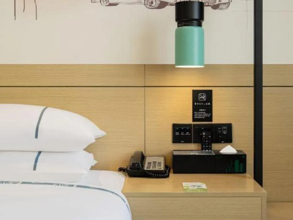 Bed in City Comfort Inn Yulin Yudong