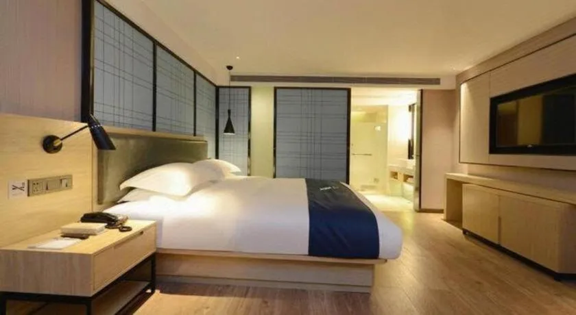 Bed in Echarm Hotel Guiyang North High-speed Railway Station