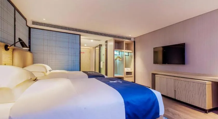 Bed in Echarm Hotel Guiyang North High-speed Railway Station