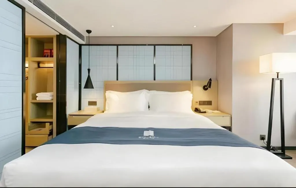 Bed in Echarm Hotel Guiyang North High-speed Railway Station